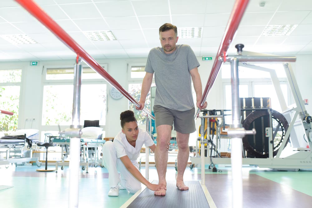 Image of man in rehabilitation with physio for Plymouth Personal Injury Solicitors