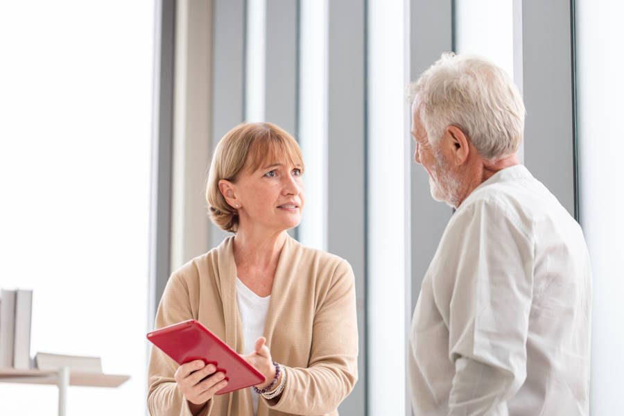 Divorcing couple arguing over a pension document